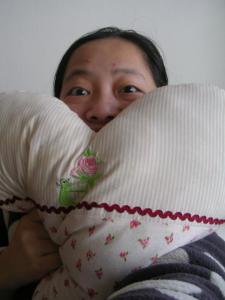 writer with a pillow
