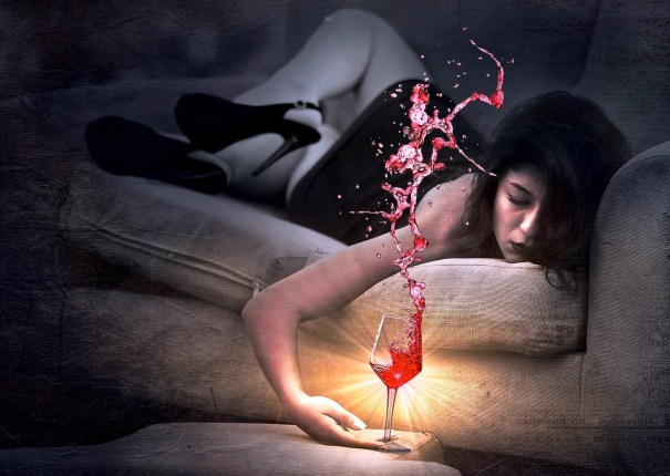 woman on couch with wine cropped